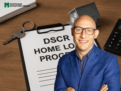 Adam Buice in front of a DSCR Home Loan Program clipboard